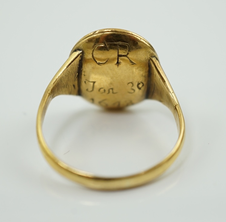 A mid 17th century Charles I gold and enamel oval memorial ring